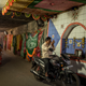 A man stops to pay respects at the Pir Baba shrine under the Narkeldanga railways tracks.